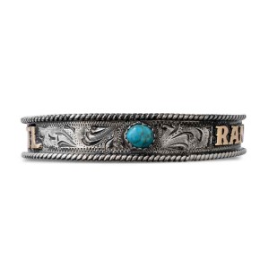 A silver cuff bracelet for men and women featuring a turquoise stone and personalized bronze lettering 