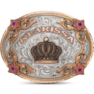 A custom belt buckle for women built on a hand engraved oval german silver base featuring a golden bronze crown figure 