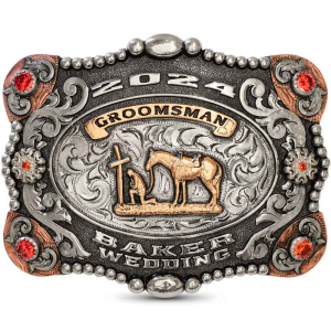 A custom wedding belt buckle for men featuring a praying cowboy figure built on a hand engraved and matted german silver base 