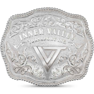 A custom silver belt buckle featuring a personalized ranch brand or logo