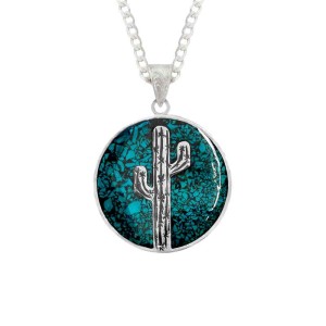 A custom pendant necklace featuring a cactus shape in a crushed turquoise base, with a sterling silver chain 