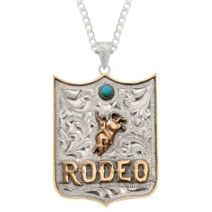 A custom pendant necklace featuring personalized bronze lettering and a bull rider figure, with a sterling silver chain 