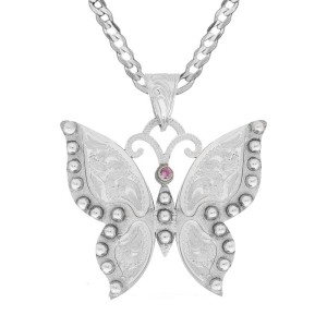 A custom pendant necklace built on a hand engraved silver base in the shape of a butterfly